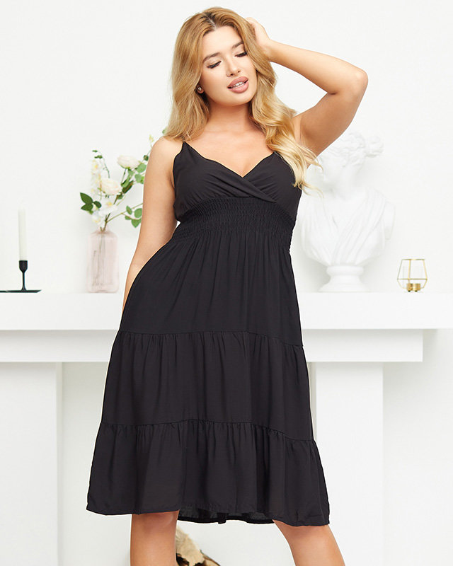 Delicate black women's dress above the knee - Clothing