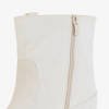 Beige cowboy boots on a covered wedge Teilor - Footwear