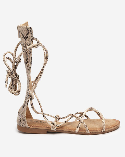 Calf-length gladiator sandals with Yenise beige embossing - Footwear