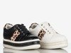 Ladies 'black sneakers on a Raffael leopard print platform - Footwear