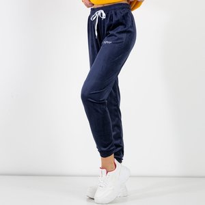 Navy blue velor sweatpants with an embroidered inscription - Clothing