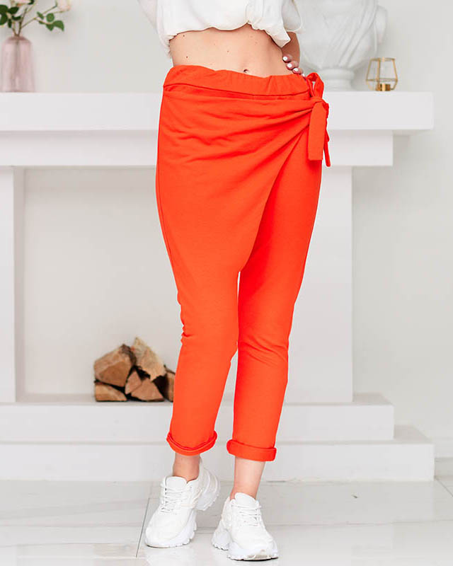 Orange women's sweatpants with a pleat and binding - Clothing