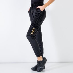 Women's black sweatpants with gold inscriptions - Clothing